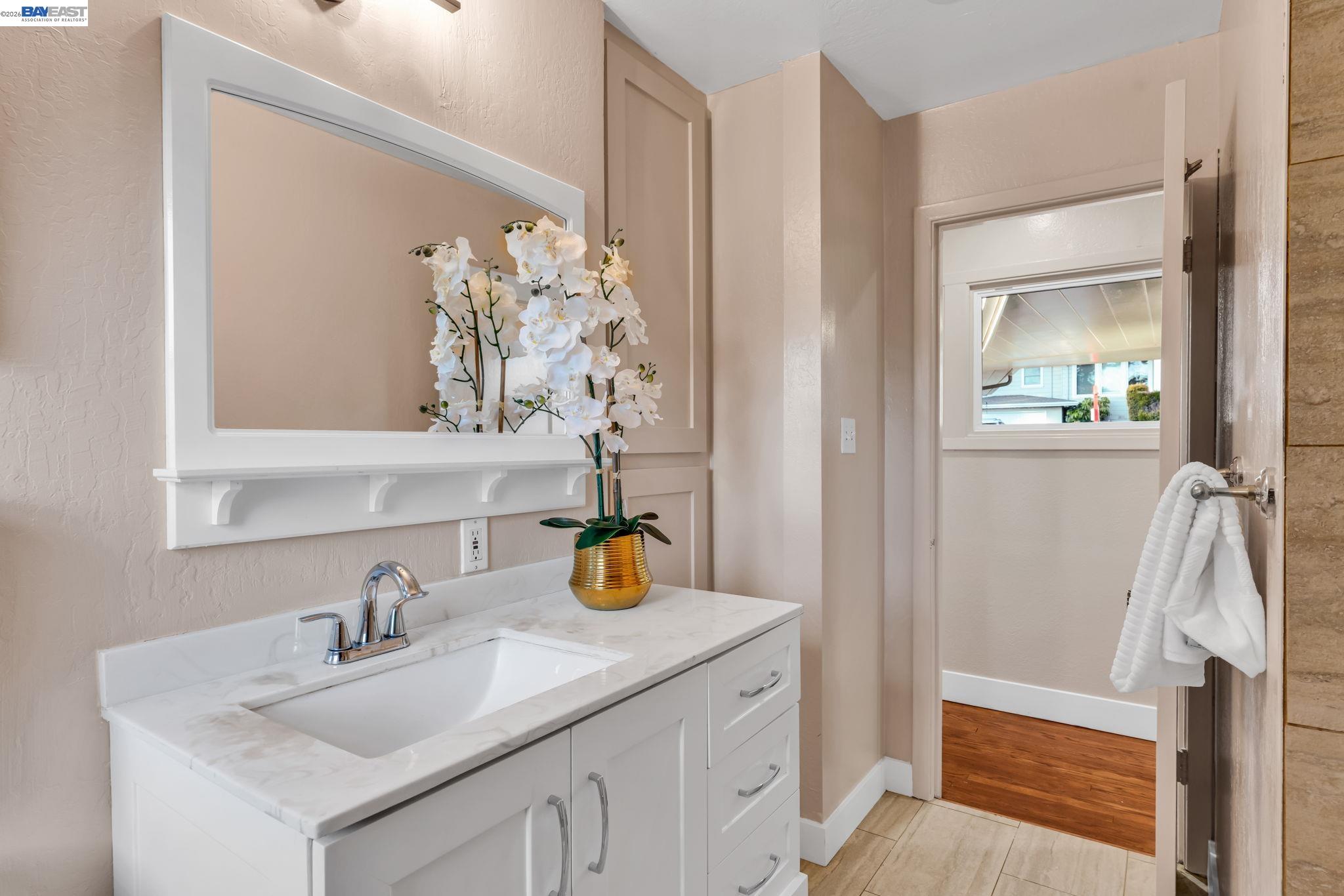 4628 Fieldbrook Road Oakland, CA 94619 - Photo 27 of 40 a bathroom with a sink and a mirror
