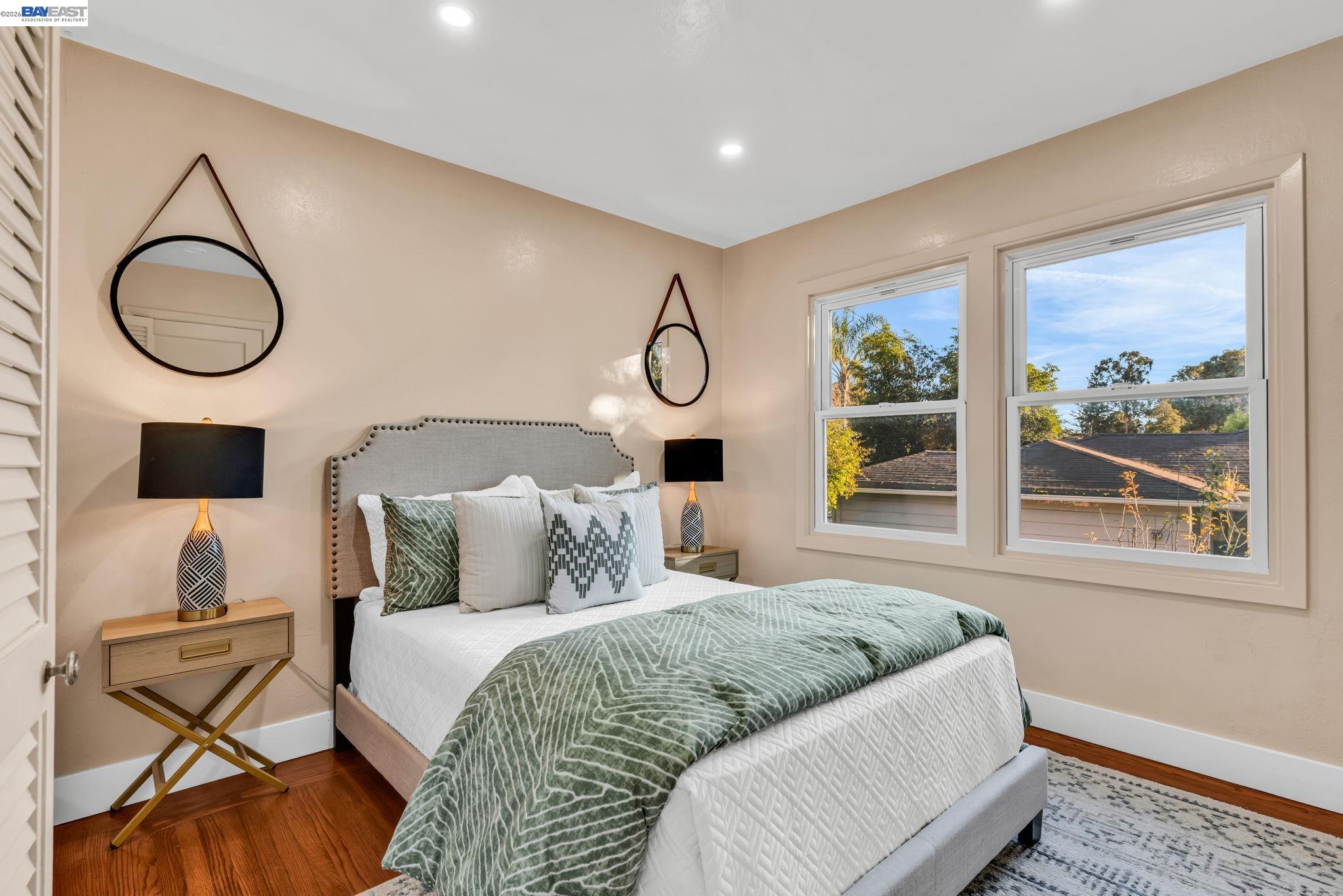 4628 Fieldbrook Road Oakland, CA 94619 - Photo 28 of 40 a bedroom with a large bed and a window