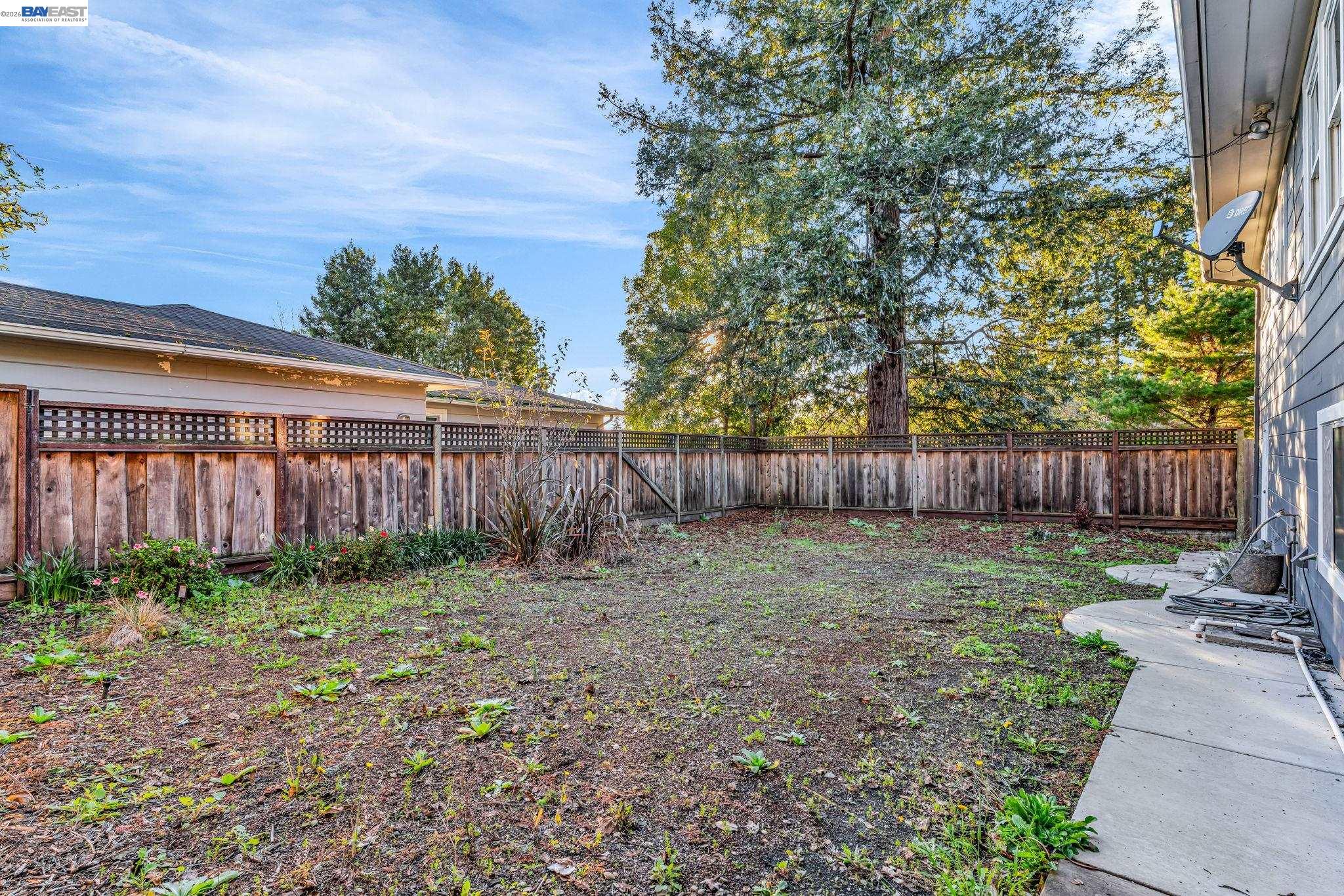 4628 Fieldbrook Road Oakland, CA 94619 - Photo 39 of 40 a backyard of a house with lots of green space