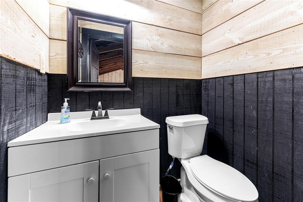 1210 VZ County Road Canton, TX 75103 - Photo 14 of 29 a bathroom with a sink a toilet and a mirror