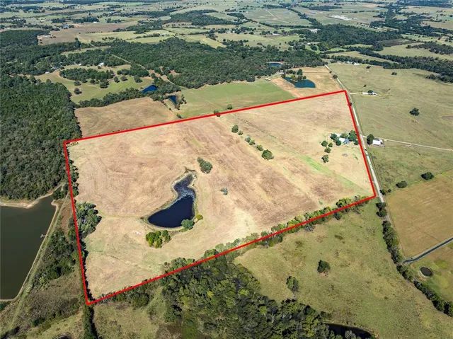 a view of swimming pool with a yard