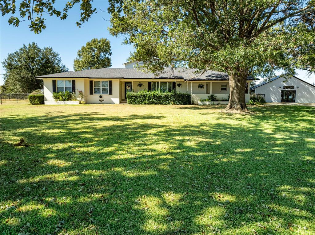 1210 VZ County Road Canton, TX 75103 - Photo 3 of 29 a front view of a house with a garden