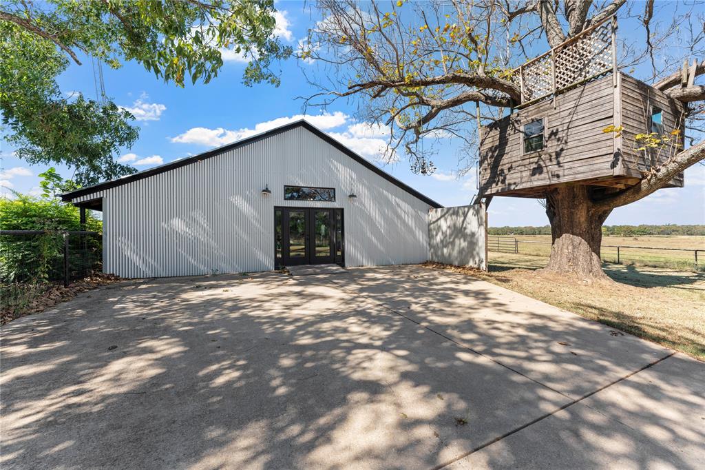 1210 VZ County Road Canton, TX 75103 - Photo 10 of 29 a backyard of a house with table and chairs