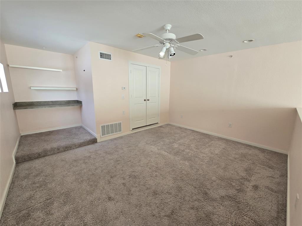 5111 Manett Street, Unit 207 Dallas, TX 75206 - Photo 5 of 10 a view of an empty room