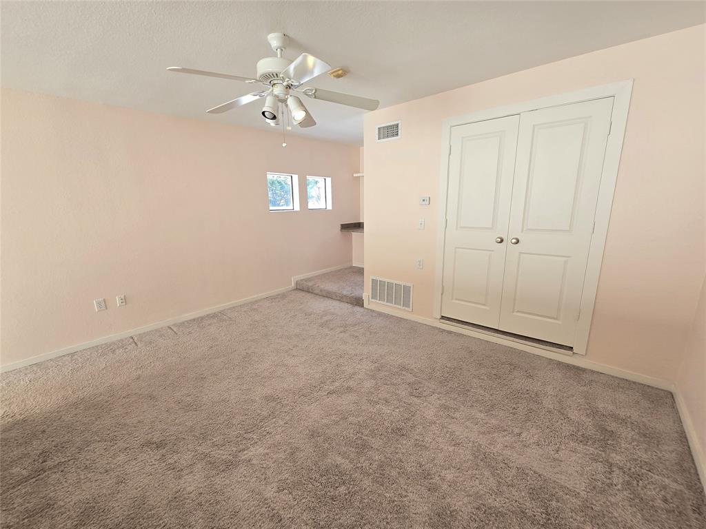 5111 Manett Street, Unit 207 Dallas, TX 75206 - Photo 6 of 10 a view of an empty room with a window