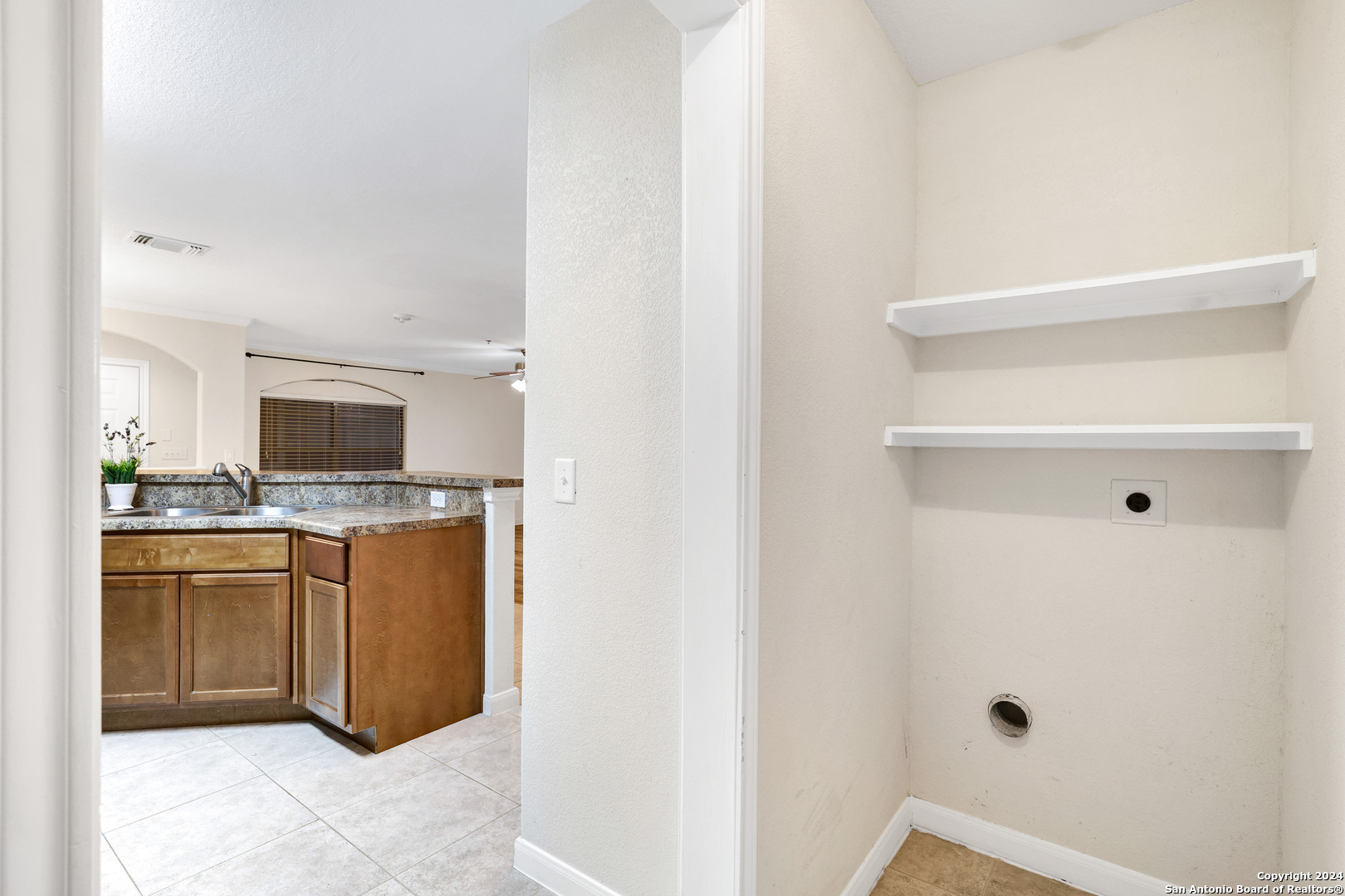 7323 Snowden Road, Unit 3108 San Antonio, TX 78240 - Photo 20 of 34 a view of cabinets with wooden floor