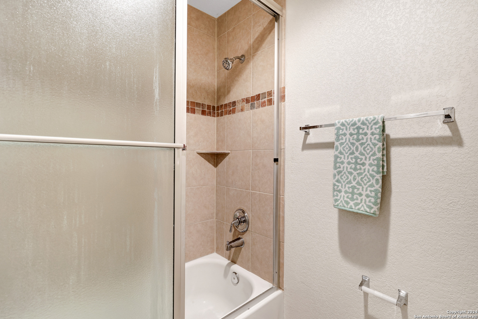 7323 Snowden Road, Unit 3108 San Antonio, TX 78229 - Photo 23 of 31 a bathroom with a shower