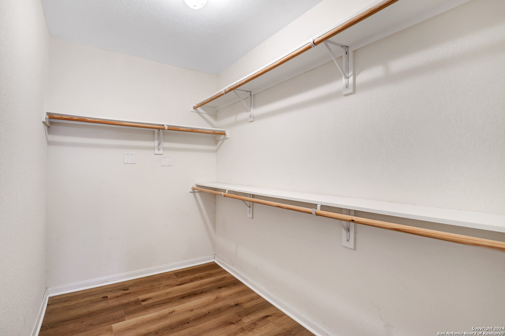 7323 Snowden Road, Unit 3108 San Antonio, TX 78240 - Photo 25 of 34 a view of a room with racks on the wall