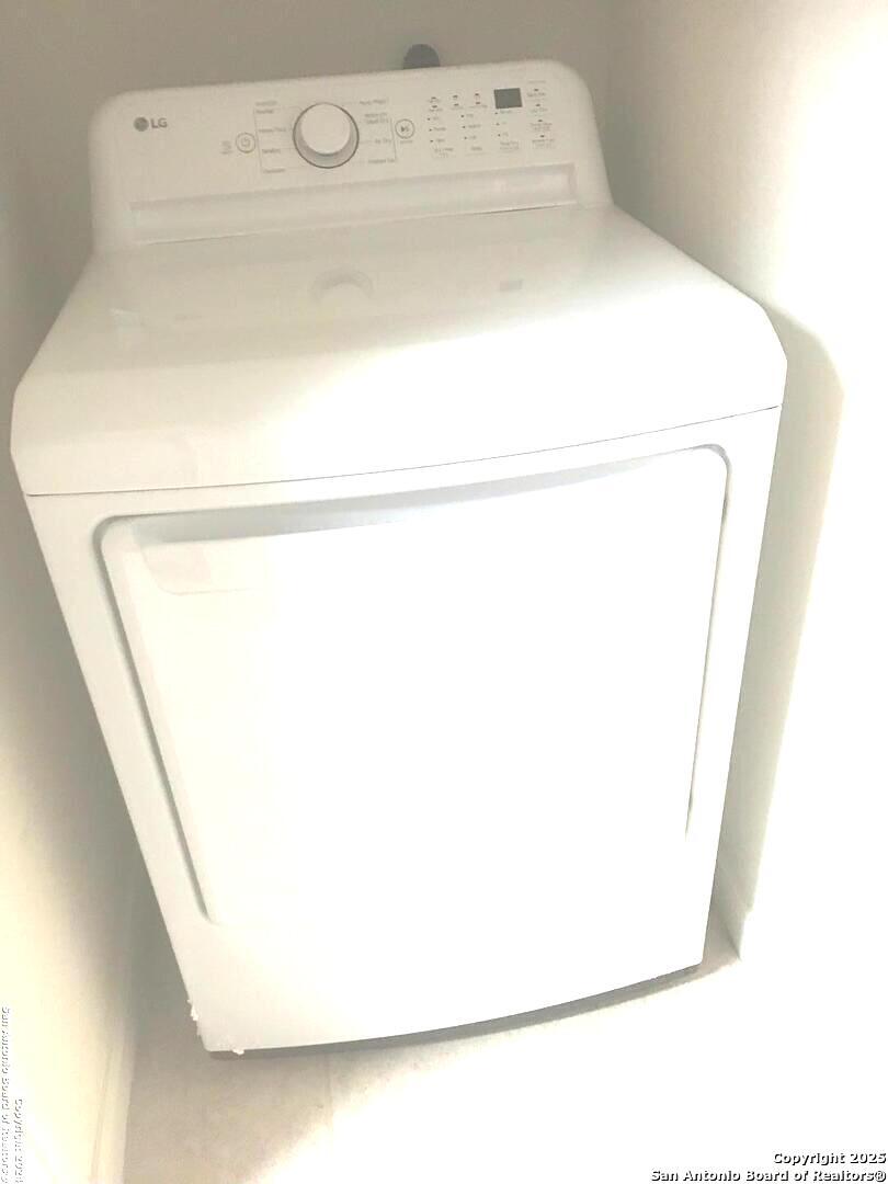 7323 Snowden Road, Unit 3108 San Antonio, TX 78229 - Photo 6 of 31 a utility room with dryer and washer