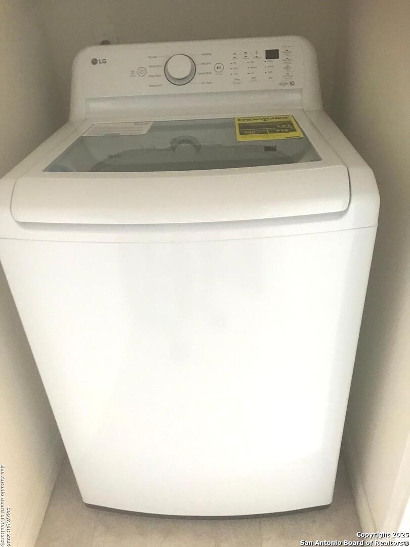 7323 Snowden Road, Unit 3108 San Antonio, TX 78240 - Photo 8 of 34 a utility room with dryer and washer