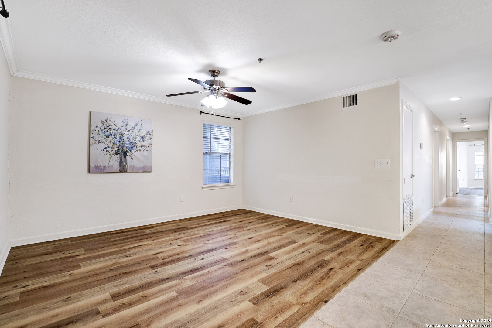 7323 Snowden Road, Unit 3108 San Antonio, TX 78229 - Photo 10 of 31 a view of an empty room with a window