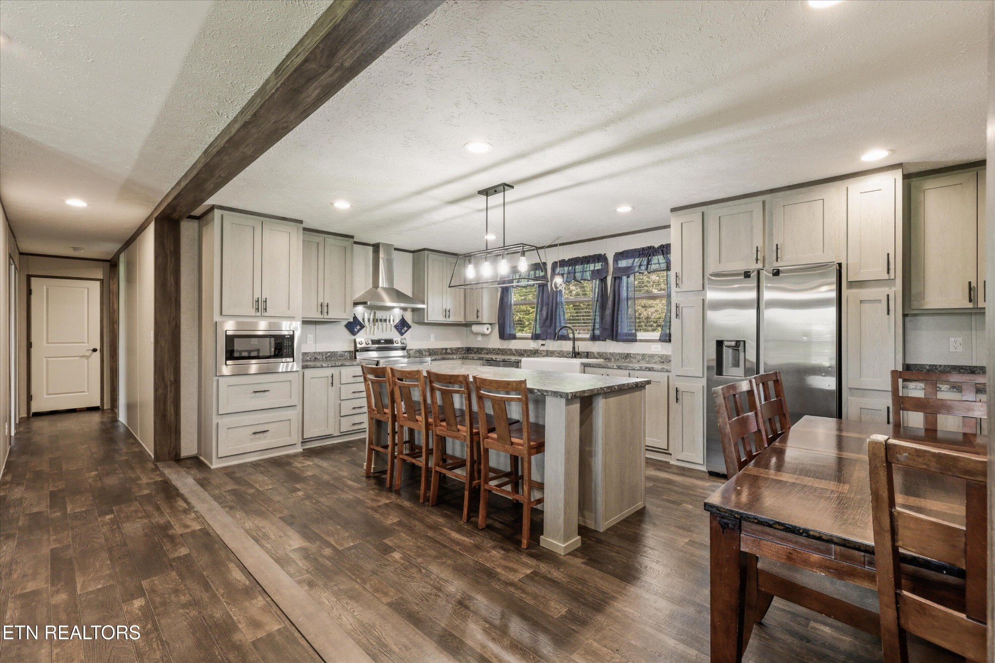 158 Frankfort Road Lancing, TN 37770 - Photo 9 of 46 a kitchen with counter top space cabinets and refrigerator