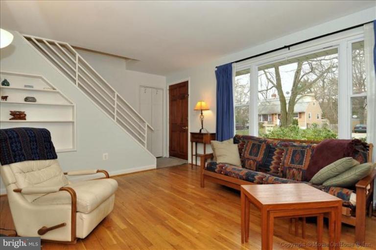 10405 Procter Street Silver Spring, MD 20901 - Photo 5 of 27 a living room with furniture and a large window