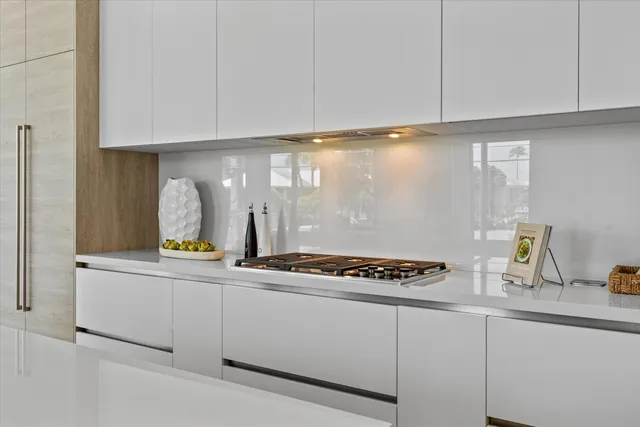 a bedroom with a large bed and a large window