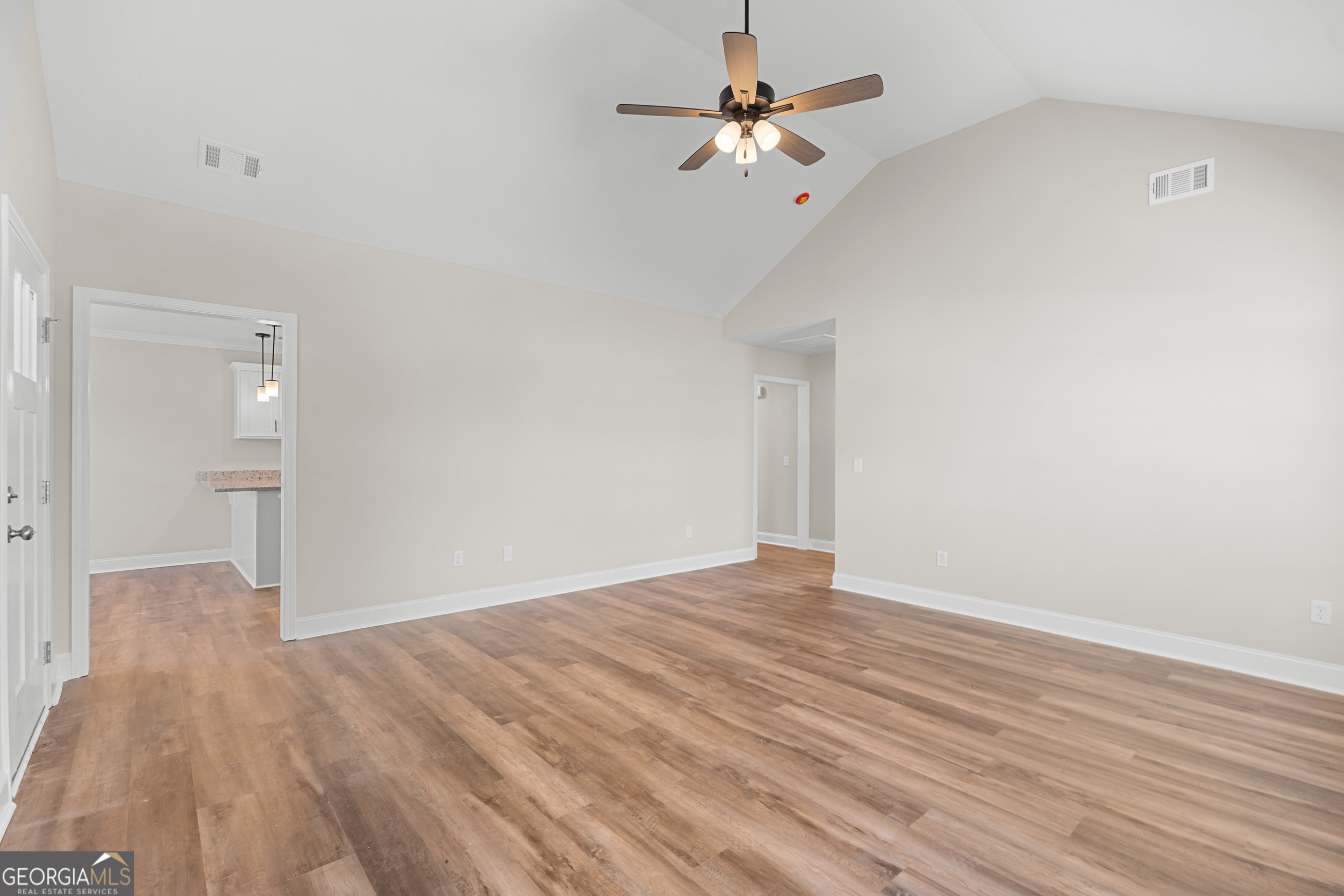 110 Enclave Court Statesboro, GA 30458 - Photo 4 of 16 a view of empty room with wooden floor