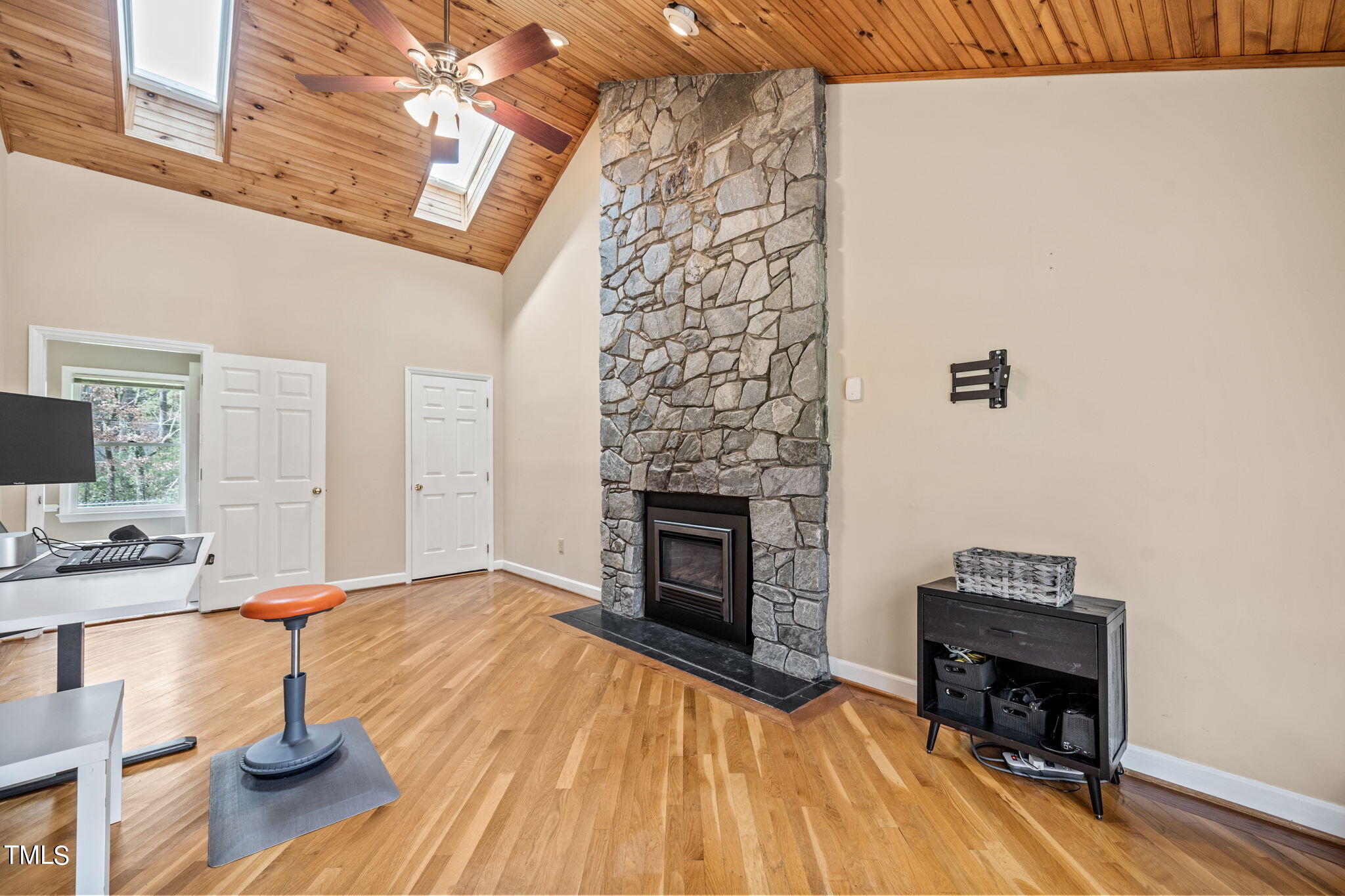 2415 Tryon Road Durham, NC 27705 - Photo 16 of 39 a living room with furniture and a fireplace
