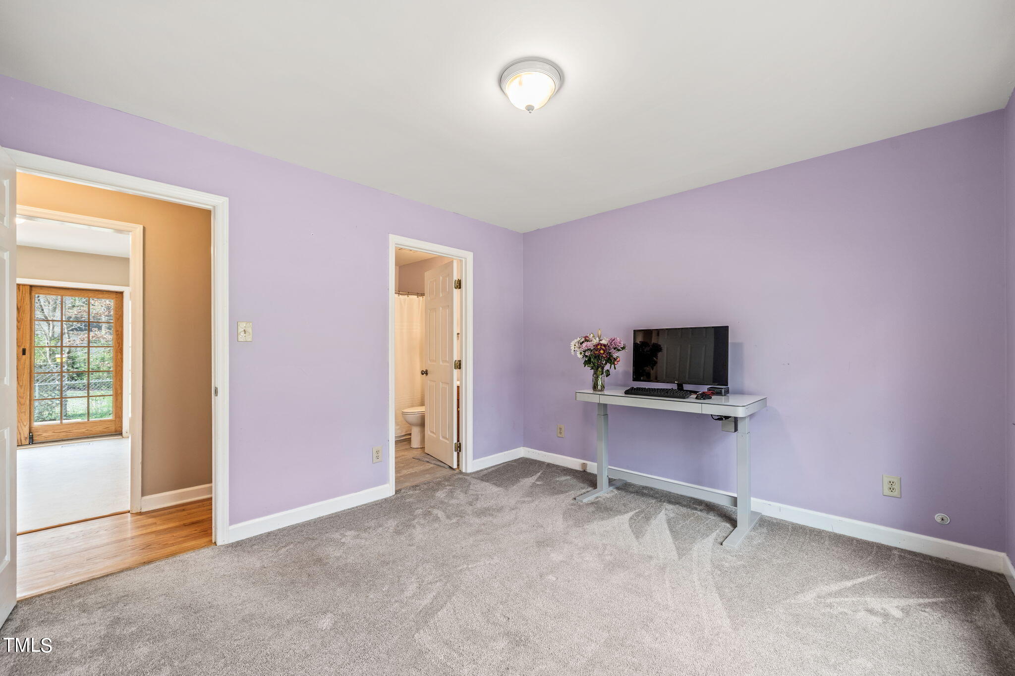 2415 Tryon Road Durham, NC 27705 - Photo 20 of 39 a view of a livingroom with a flat screen tv