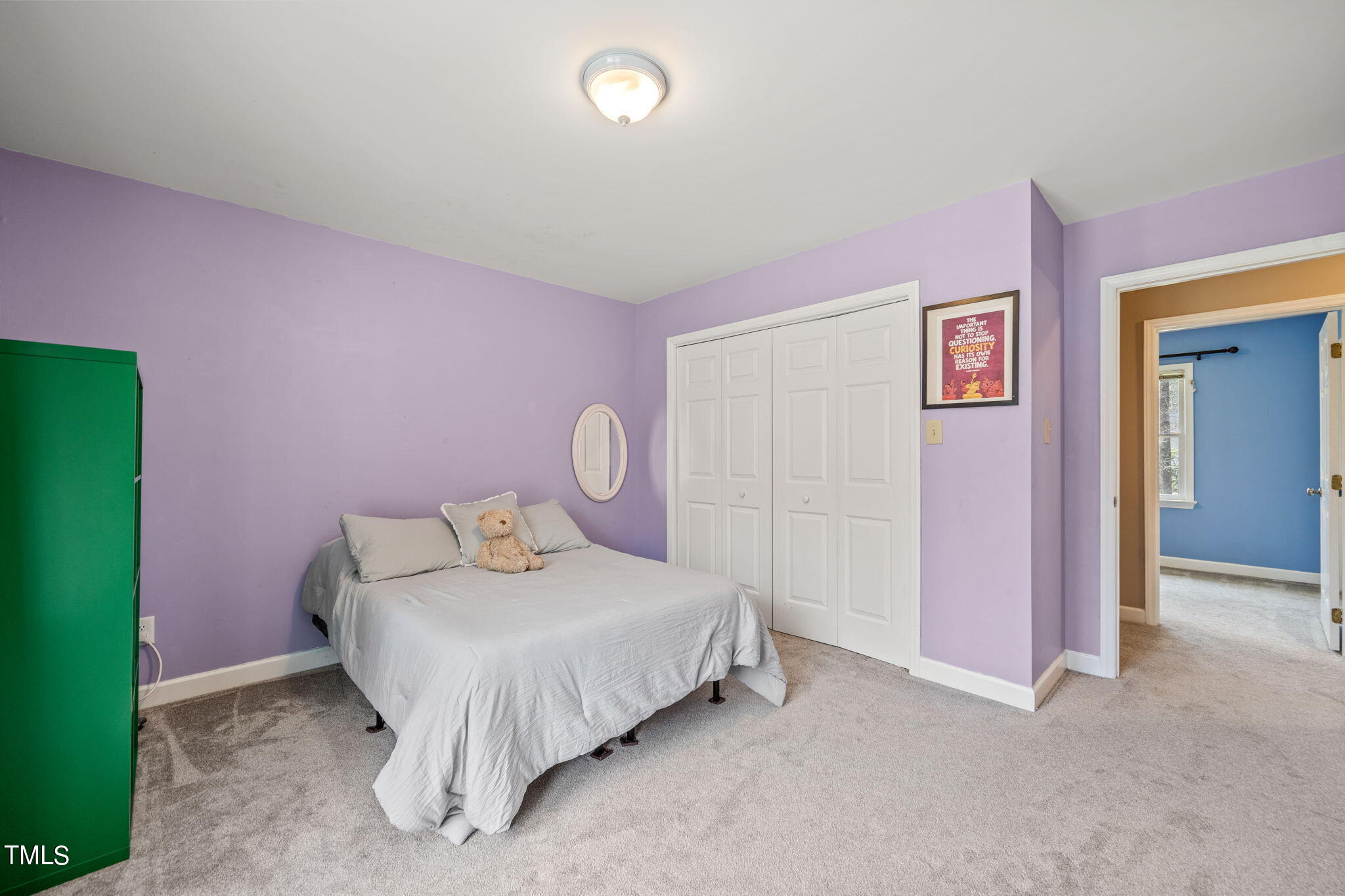 2415 Tryon Road Durham, NC 27705 - Photo 27 of 39 a bed room with a bed and a chair