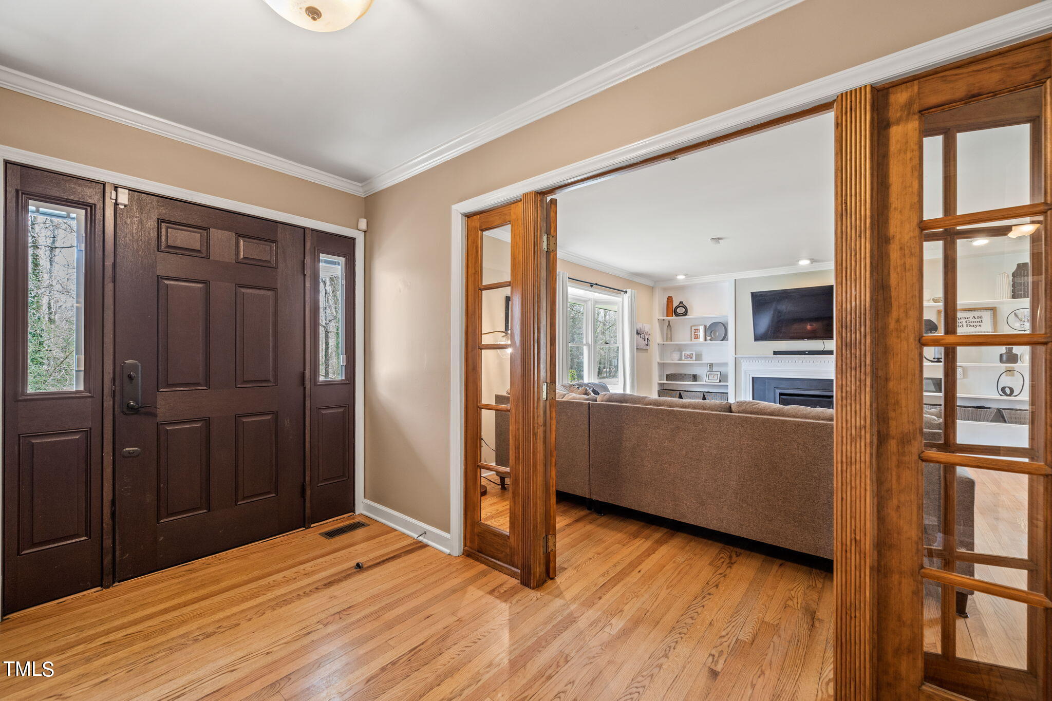 2415 Tryon Road Durham, NC 27705 - Photo 3 of 39 a room with window and wooden floor