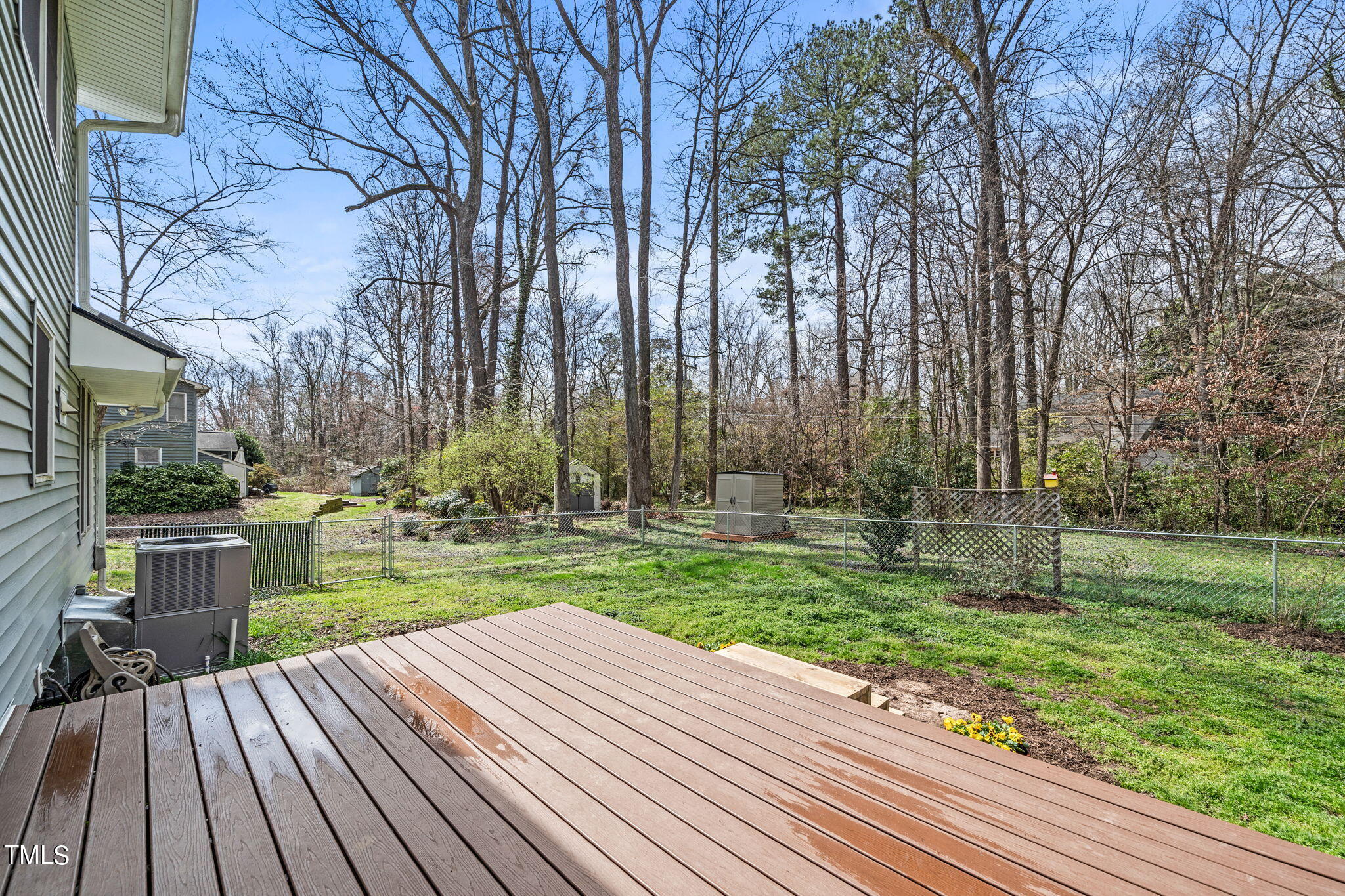 2415 Tryon Road Durham, NC 27705 - Photo 31 of 39 a view of a backyard with wooden floor