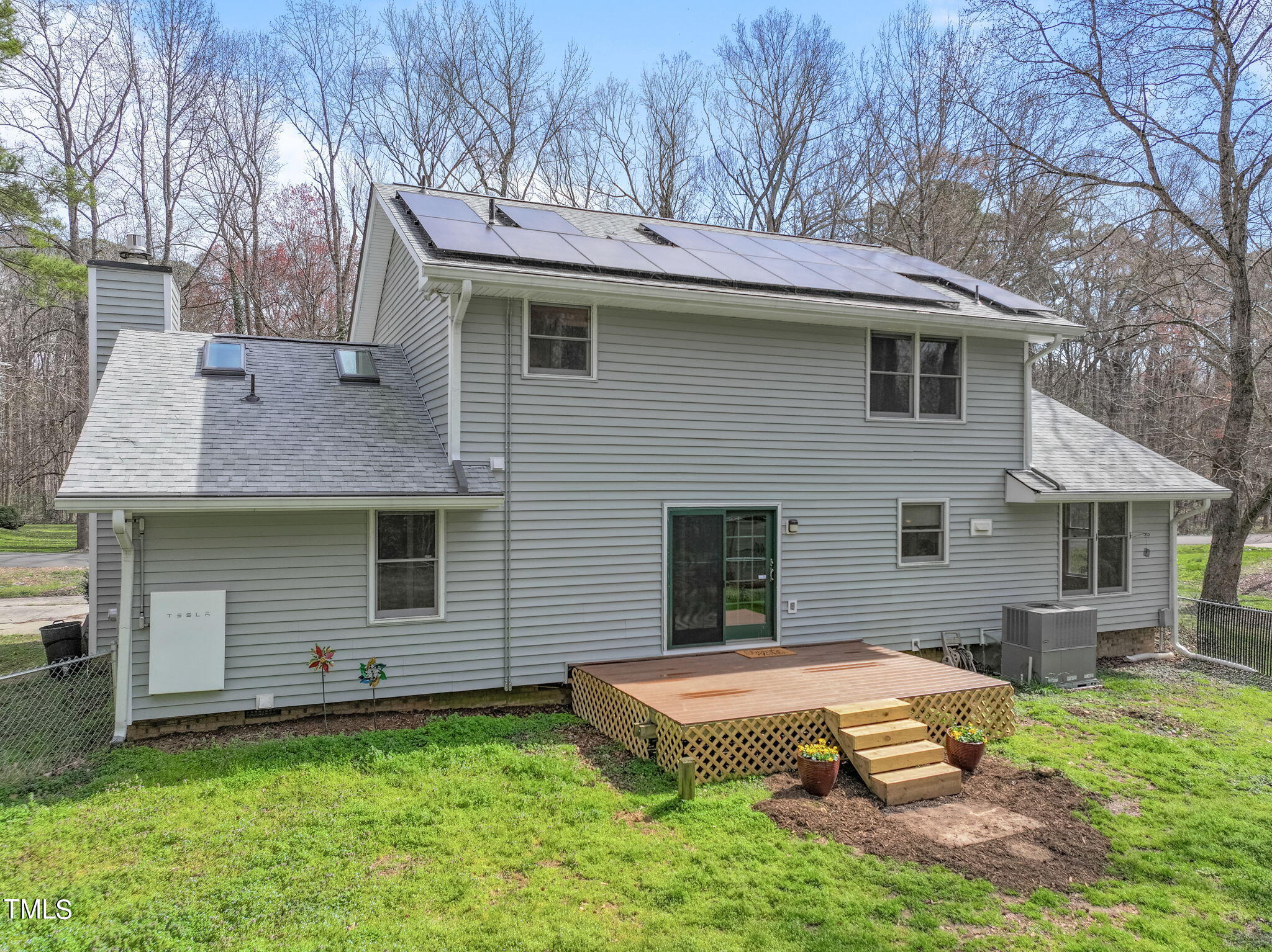 2415 Tryon Road Durham, NC 27705 - Photo 33 of 39 a view of a house with a yard and sitting area