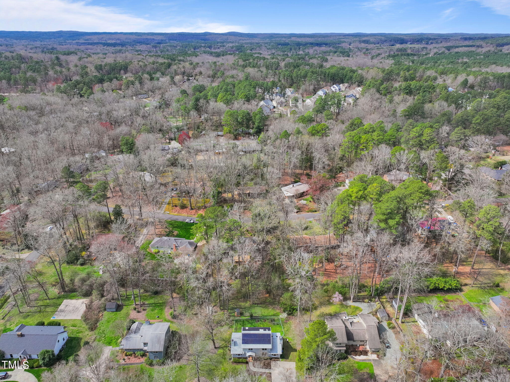 2415 Tryon Road Durham, NC 27705 - Photo 36 of 39 a view of a city with lush green forest