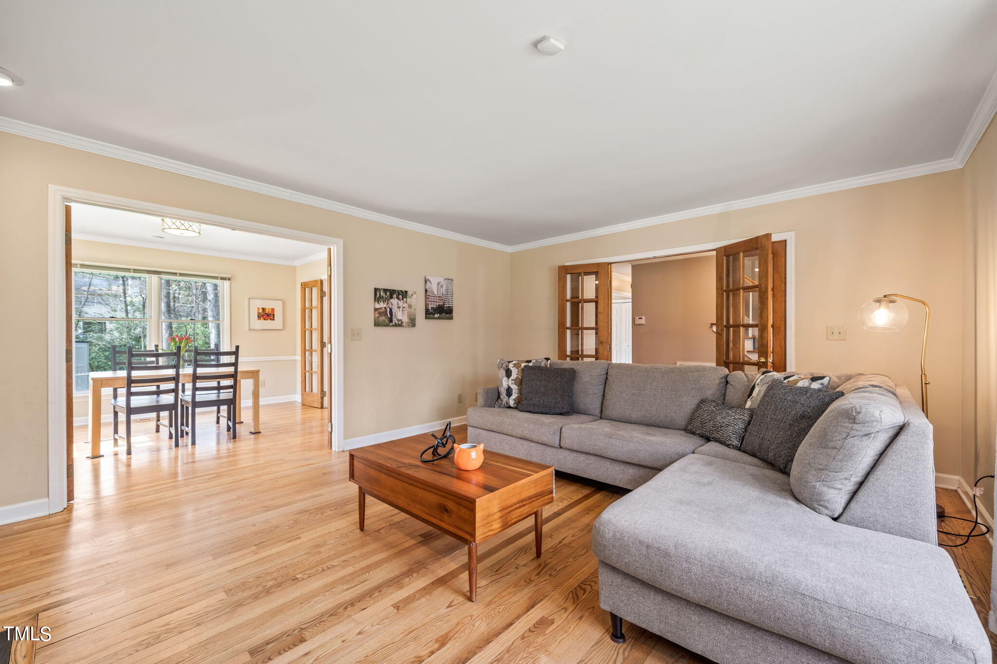 2415 Tryon Road Durham, NC 27705 - Photo 6 of 39 a living room with furniture and a wooden floor