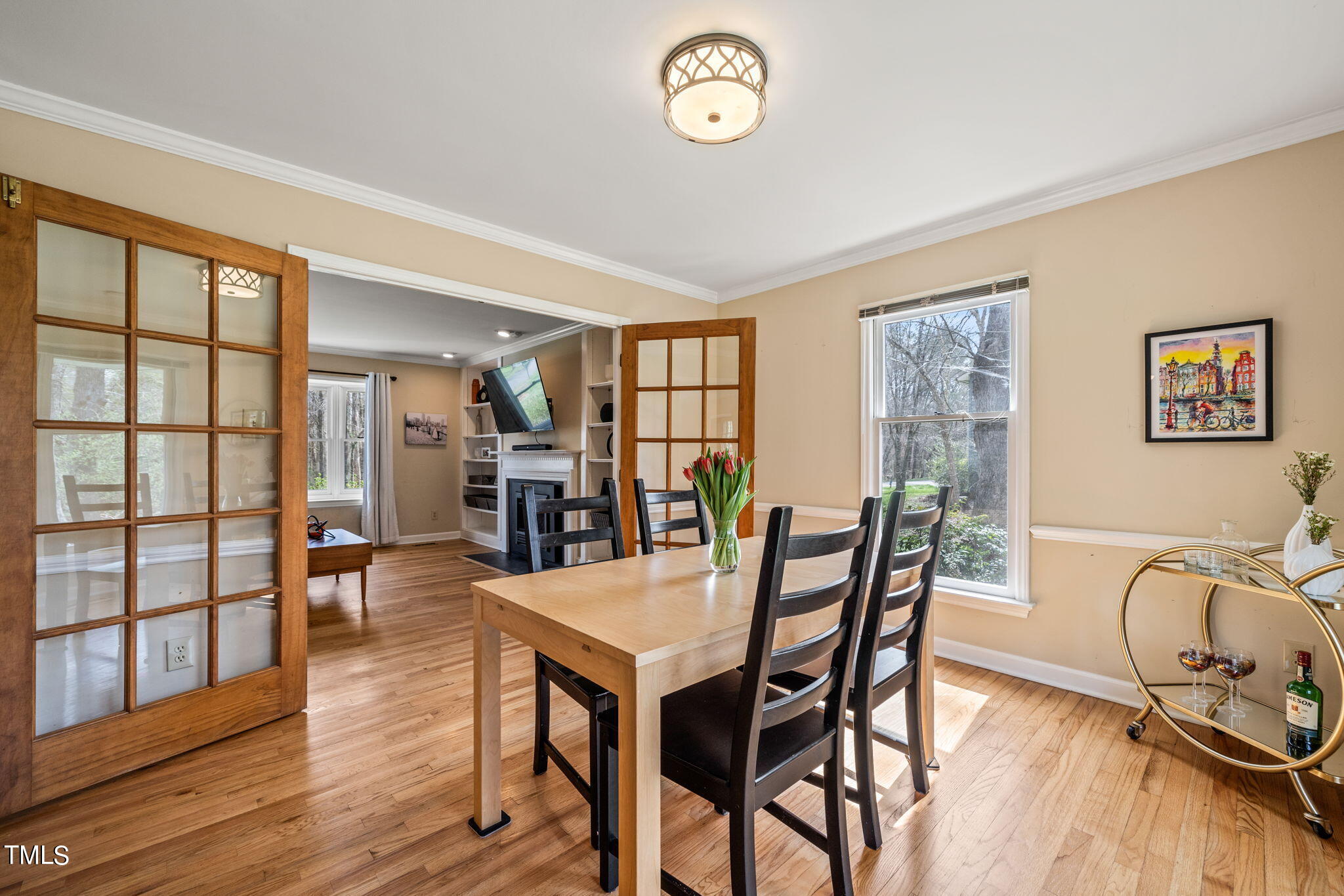 2415 Tryon Road Durham, NC 27705 - Photo 7 of 39 a view of a dining room with furniture window and wooden floor