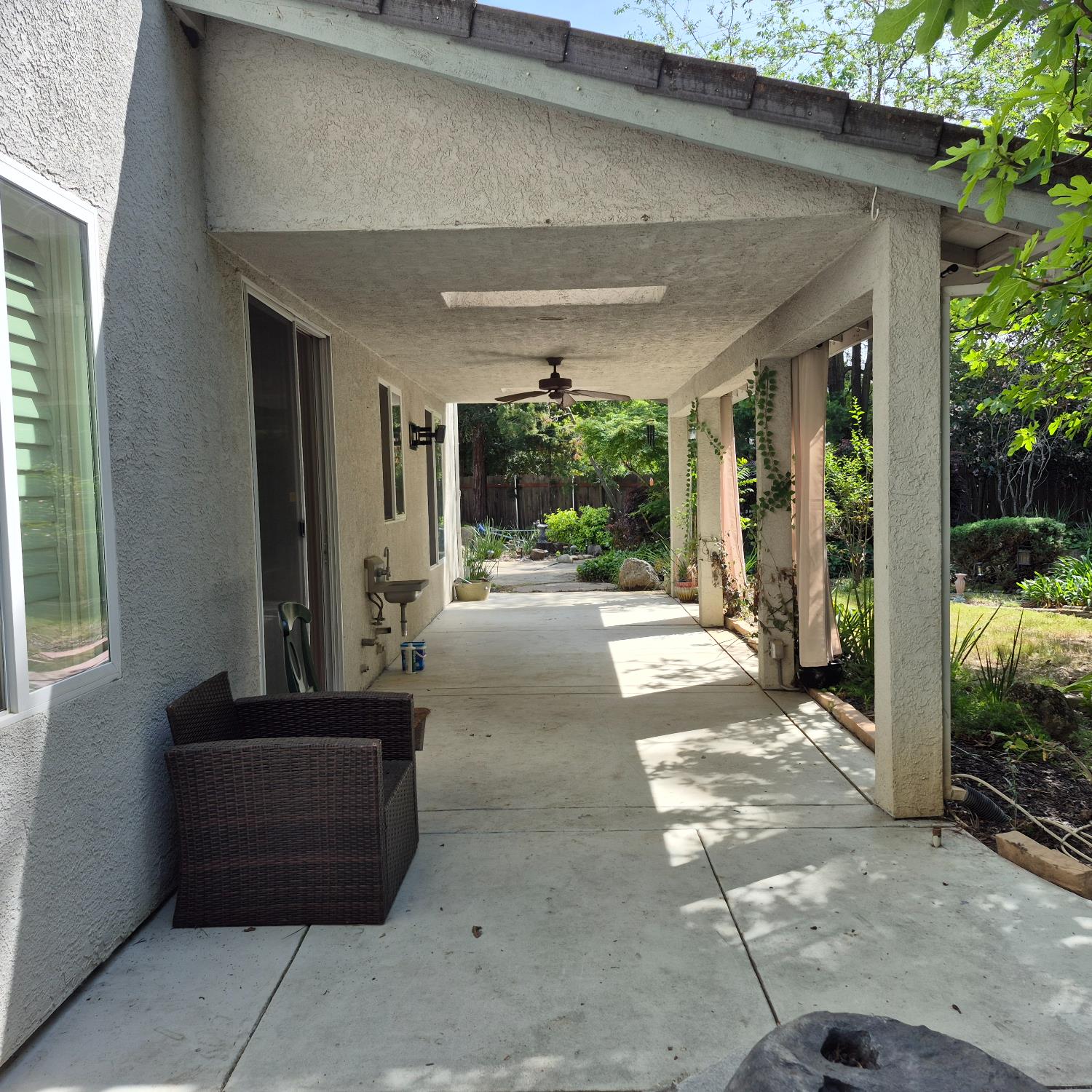2604 Javan Lane Carmichael, CA 95608 - Photo 38 of 40 a view of a patio with table and chairs a barbeque