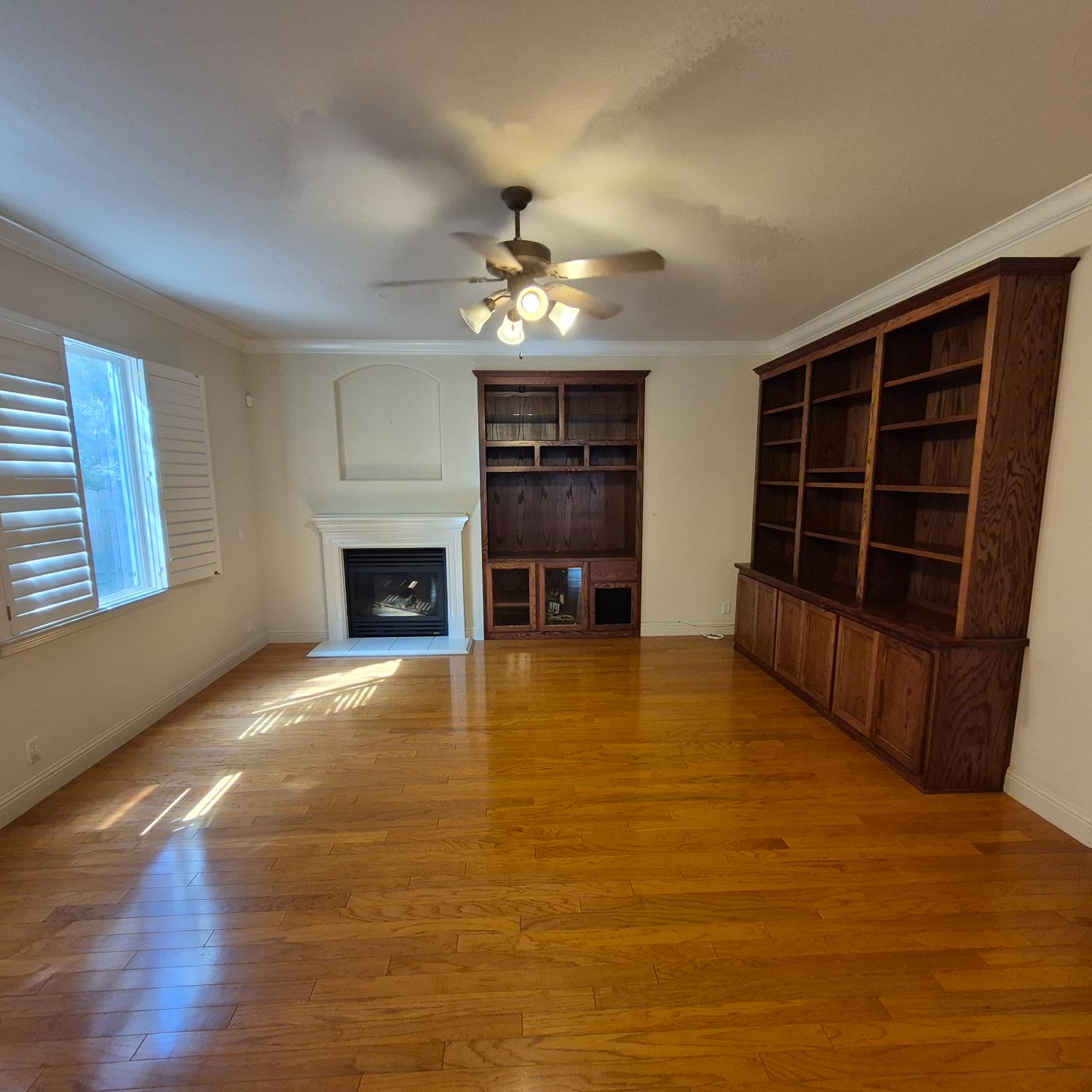 2604 Javan Lane Carmichael, CA 95608 - Photo 6 of 40 a view of an empty room with a fireplace and a window