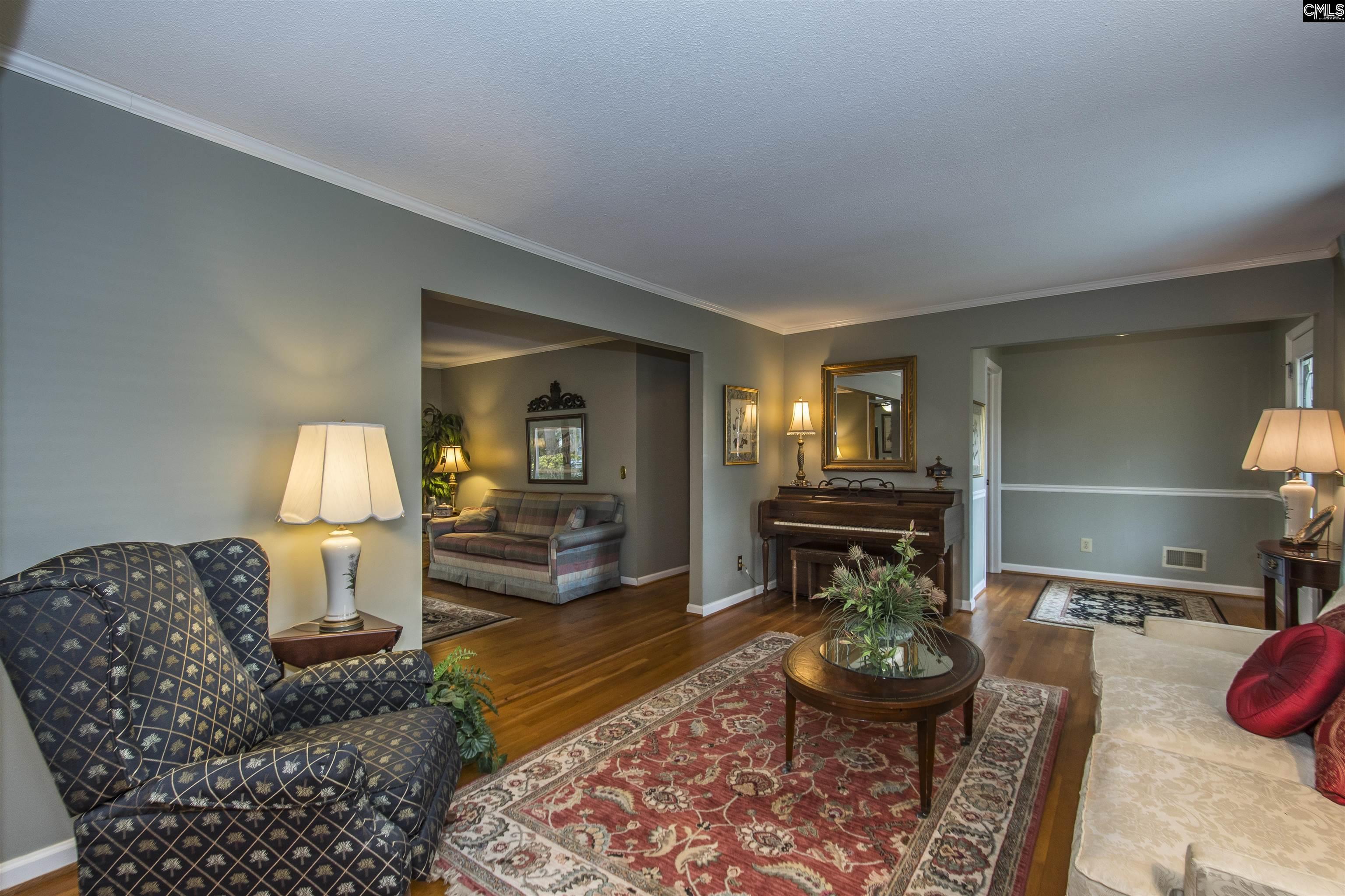 2309 Cunningham Road Columbia, SC 29210 - Photo 21 of 41 a living room with furniture and a wooden floor
