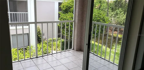 a view of backyard from balcony