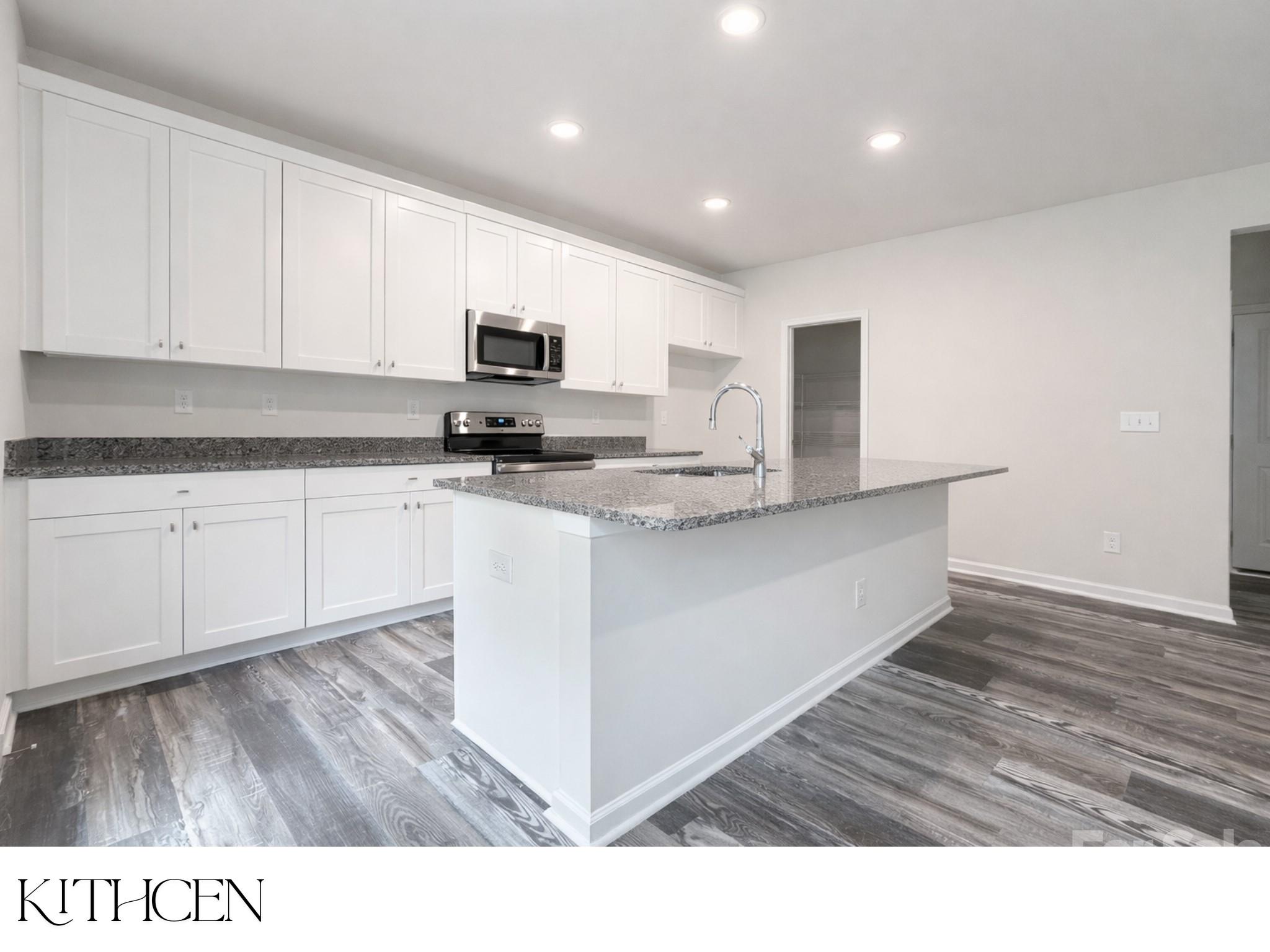 305 Firefly Path Shelby, NC 28150 - Photo 6 of 28 a kitchen with granite countertop a sink cabinets and wooden floor