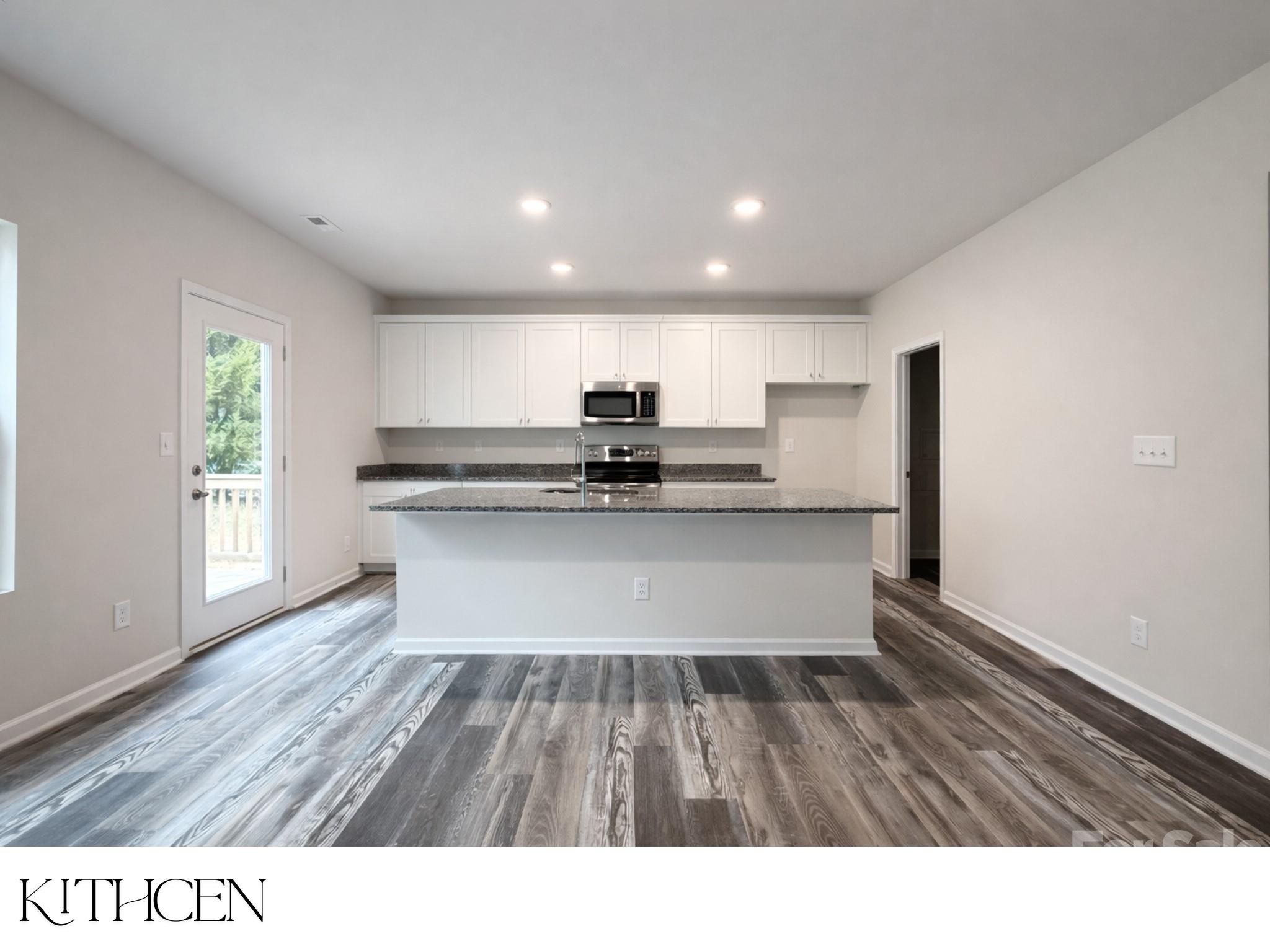 305 Firefly Path Shelby, NC 28150 - Photo 7 of 28 a kitchen with kitchen island a sink dishwasher a stove and a refrigerator with wooden floor