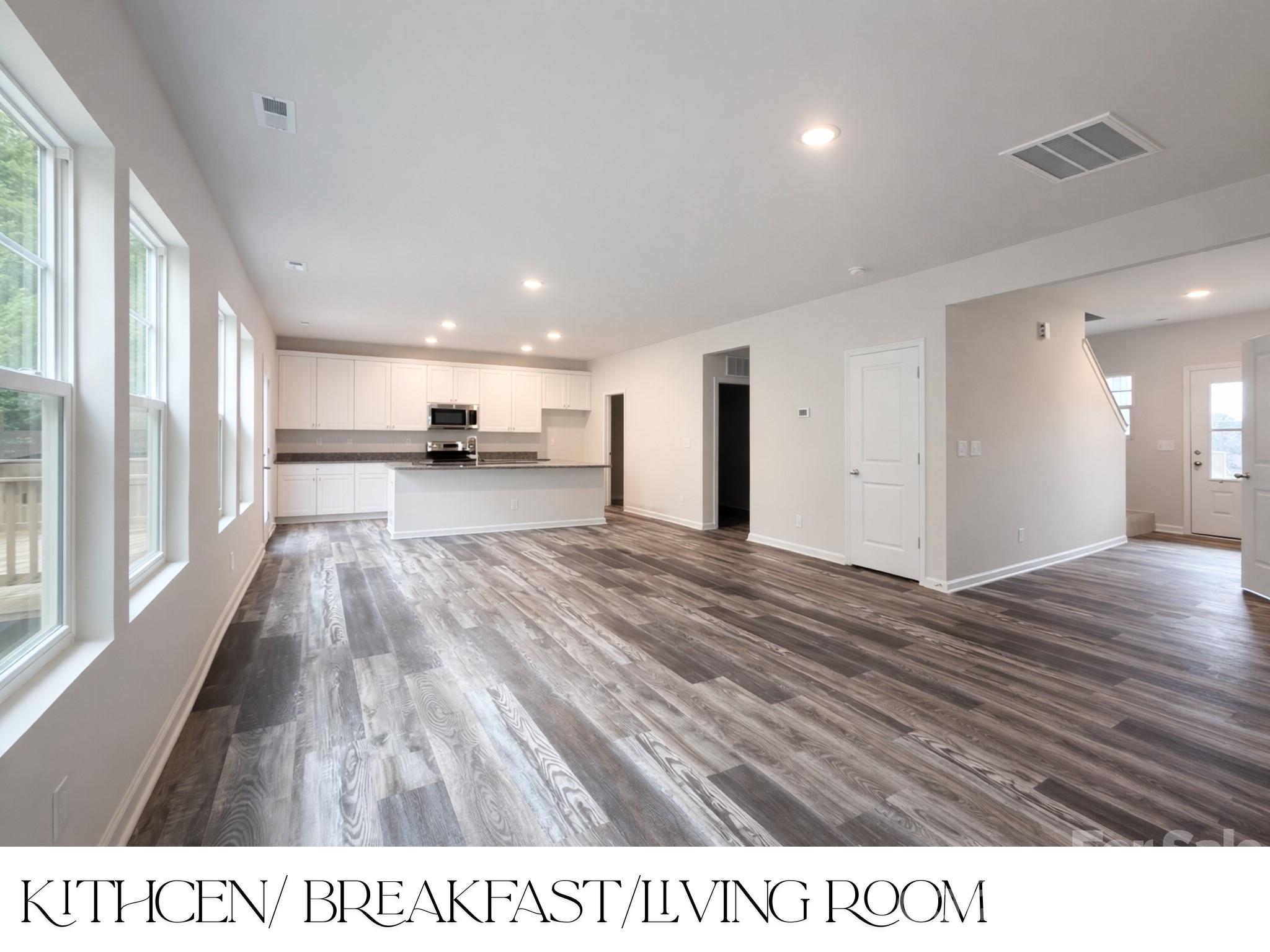 305 Firefly Path Shelby, NC 28150 - Photo 8 of 28 a open hall with white cabinets and wooden floor