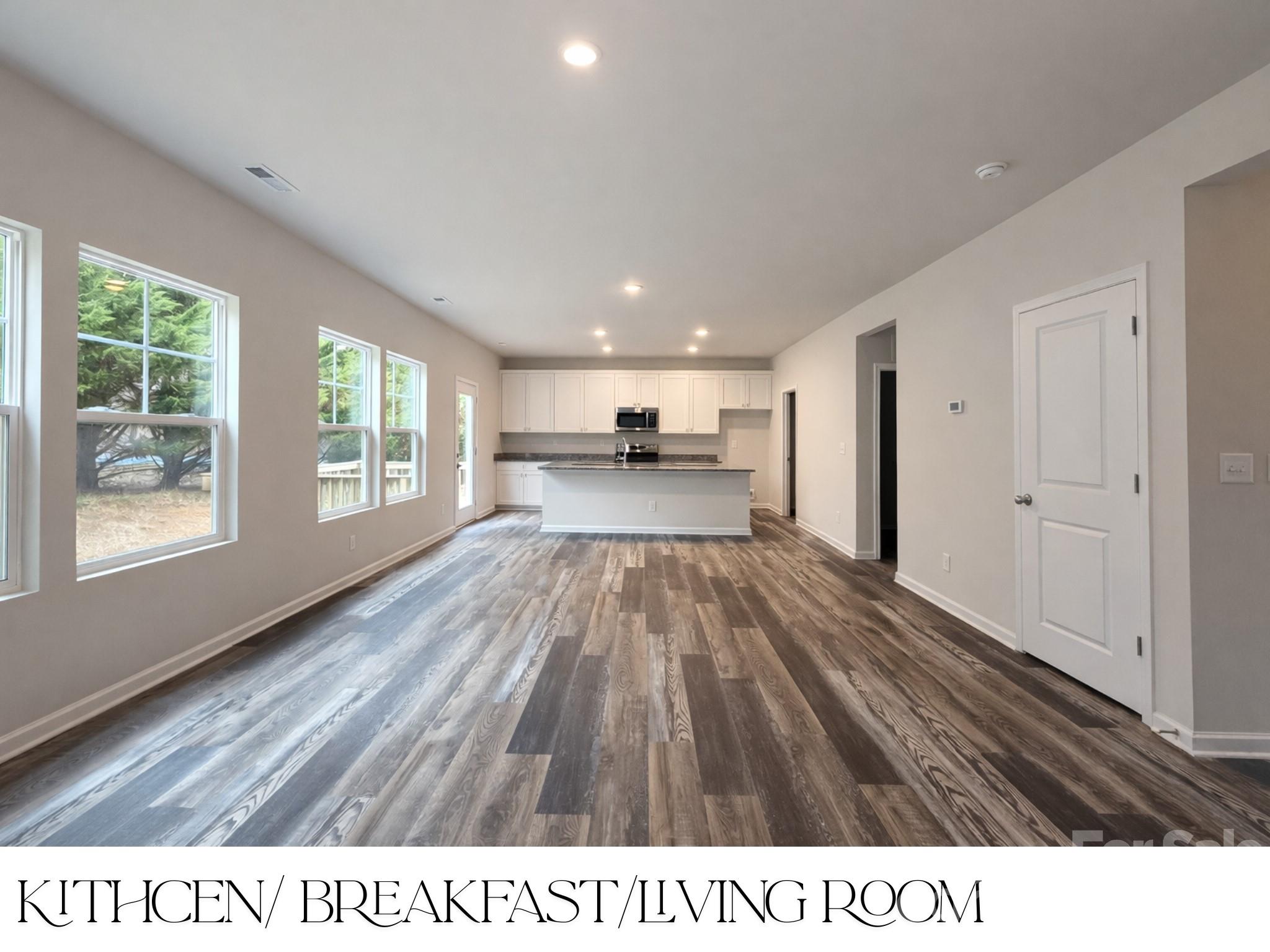 305 Firefly Path Shelby, NC 28150 - Photo 9 of 28 a open hall with wooden floor an entryway