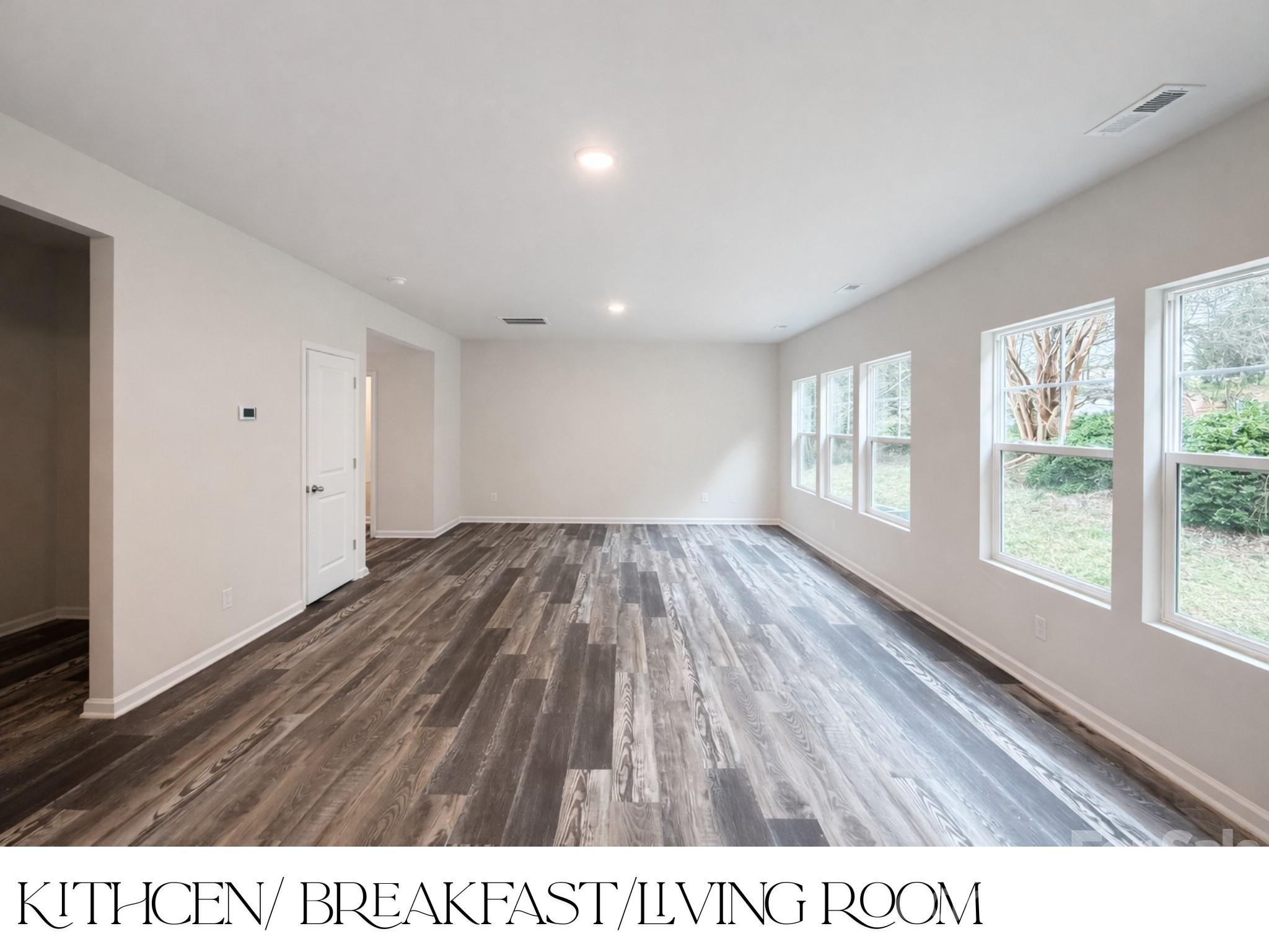 305 Firefly Path Shelby, NC 28150 - Photo 10 of 28 a open hall with wooden floor and windows