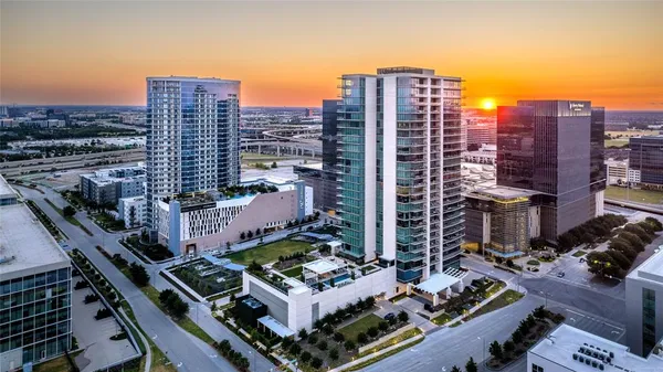 a view of a city with tall buildings