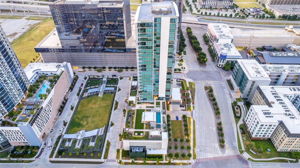 7901 Windrose Avenue, Unit 702 Plano, TX 75024 - Photo 2 of 40 a aerial view of multi story residential apartment building with outdoor space
