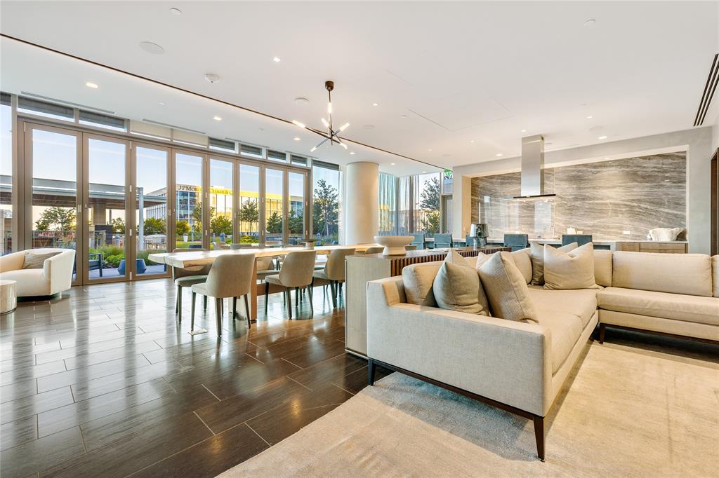 7901 Windrose Avenue, Unit 702 Plano, TX 75024 - Photo 36 of 40 a living room with furniture and a large window