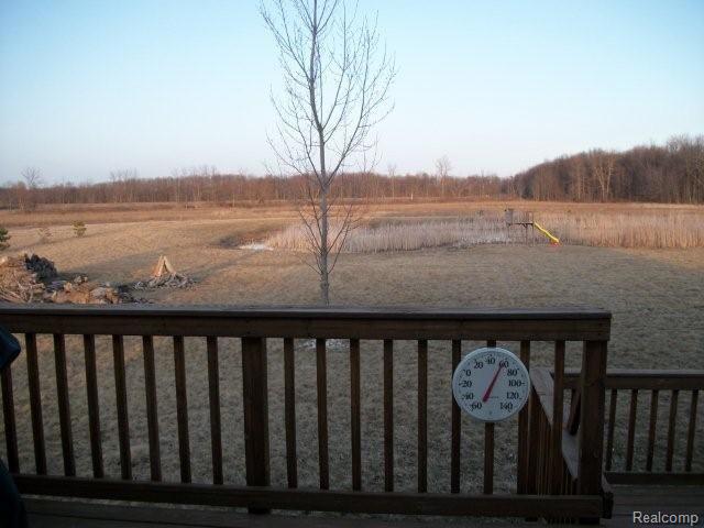 4784 Cade Road Capac, MI 48014 - Photo 4 of 10 Backyard pond firepit