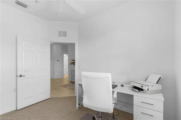 a workspace with a desk and chair
