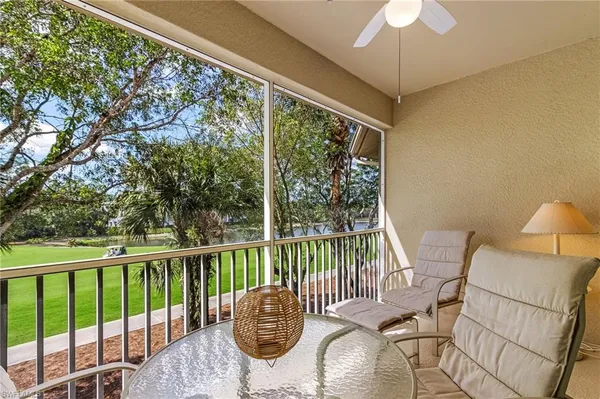 a view of a balcony with wooden floor