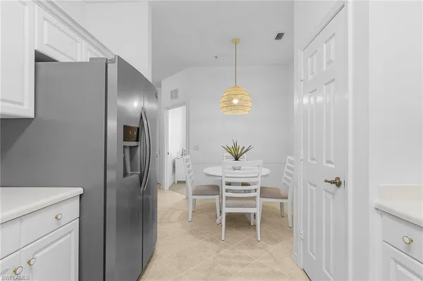 a view of dining room and wooden floor