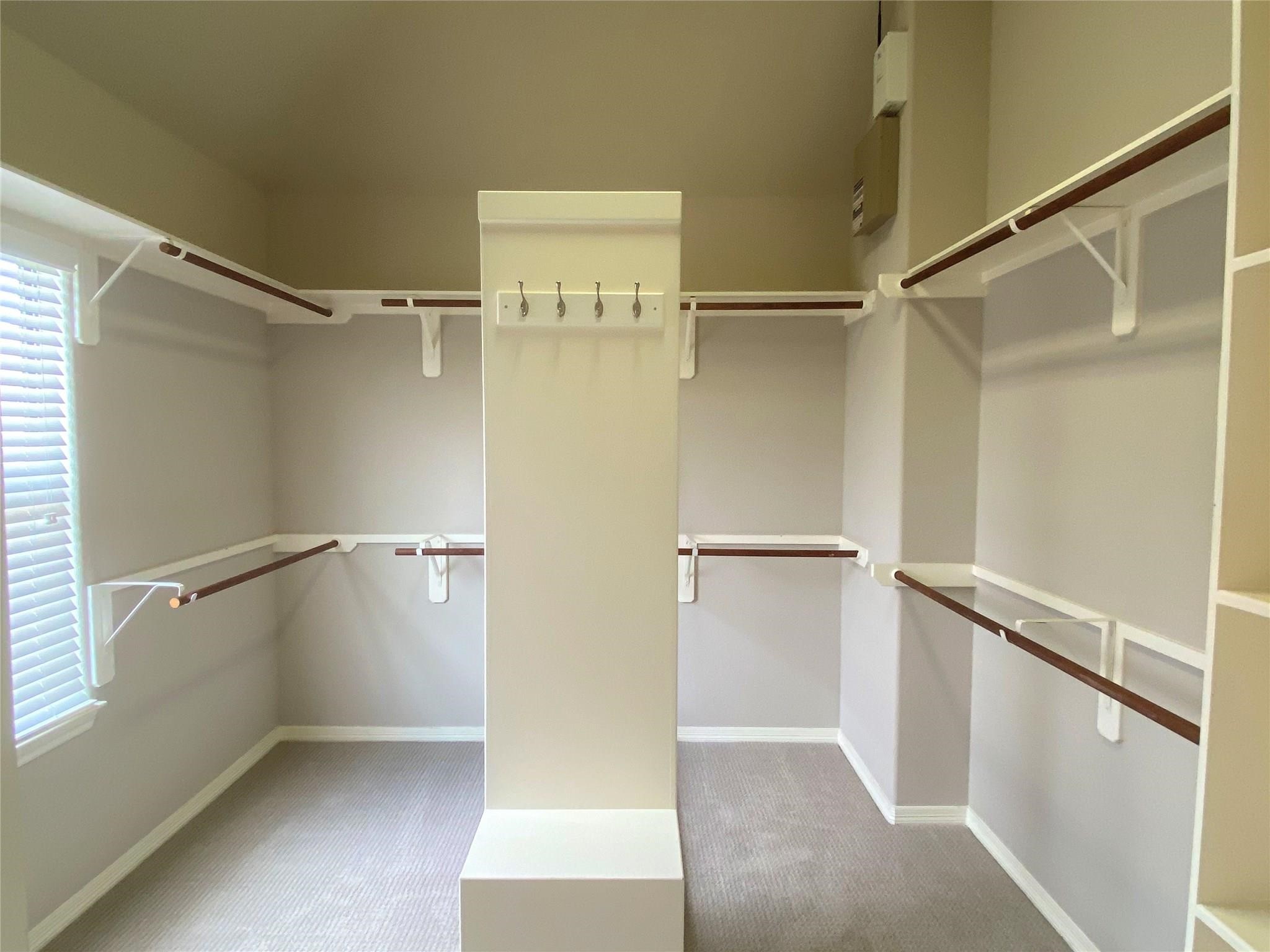 3002 Soutine Street Houston, TX 77021 - Photo 8 of 12 a view of walk in closet with empty racks