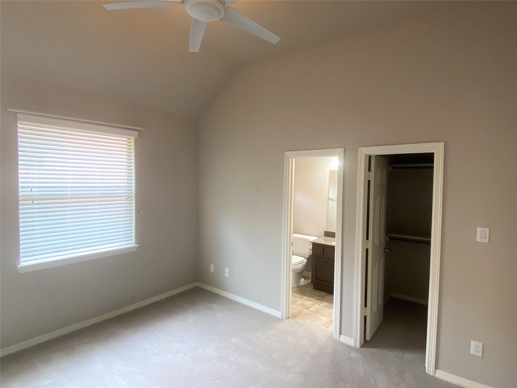 3002 Soutine Street Houston, TX 77021 - Photo 9 of 12 an empty room with a window and a bathroom