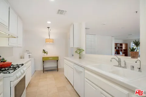 a room with furniture and a flat screen tv