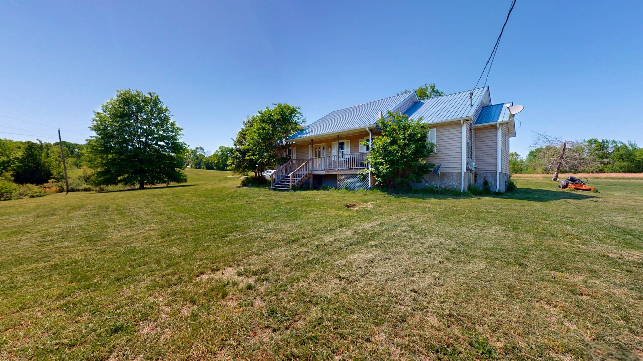 881 Coaling Road Charlotte, TN 37036 - Photo 19 of 29 a house view with a garden space
