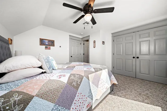 a bathroom with a sink toilet and a mirror