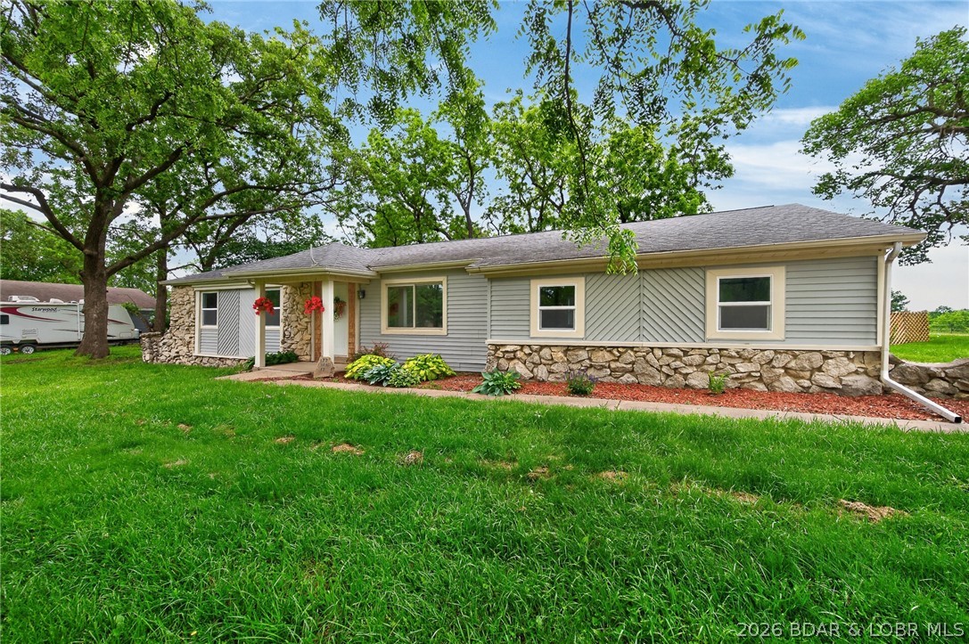 177 Storage Road Eldon, MO 65026 - Photo 2 of 34 New windows, flooring, and so much more await you
